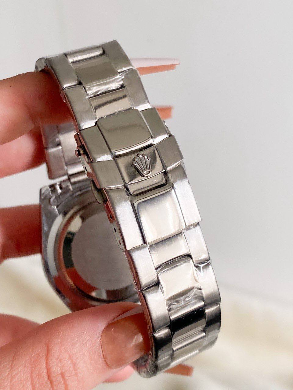 ROLEX Oyster Perpetual green dial